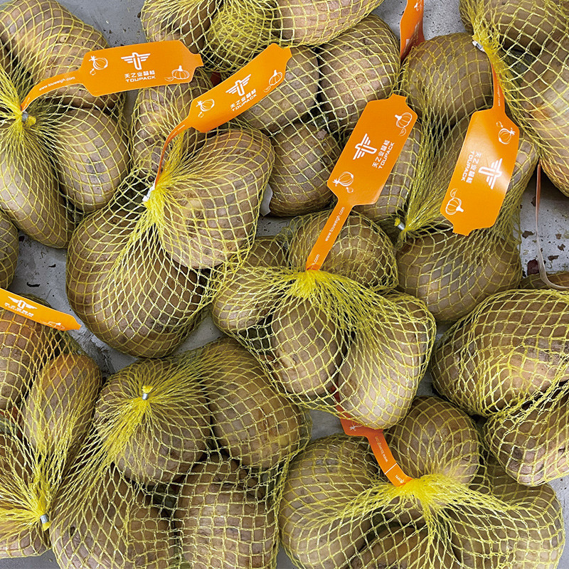 دستگاه بسته بندی کیسه ی نارنجی سیب زمینی سیب زمینی کیسه ی شبکه ای کلیپر بسته بندی میش کیسه ی مهر و موم ماشین برش