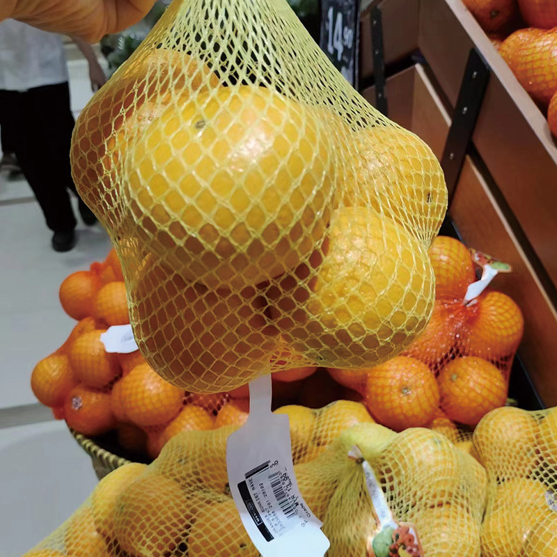 دستگاه بسته‌بندی کیسه توری انار با وزن‌کشی چند سر، دستگاه بسته‌بندی کیسه توری زنجبیل، پیاز، سیر