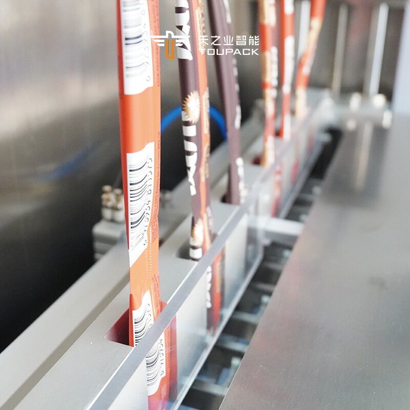 دستگاه بسته بندی خودکار چند لاین 50ml 100ml کیسه مایع آبمیوه یخ لولی پاپ ژله ی چوبی